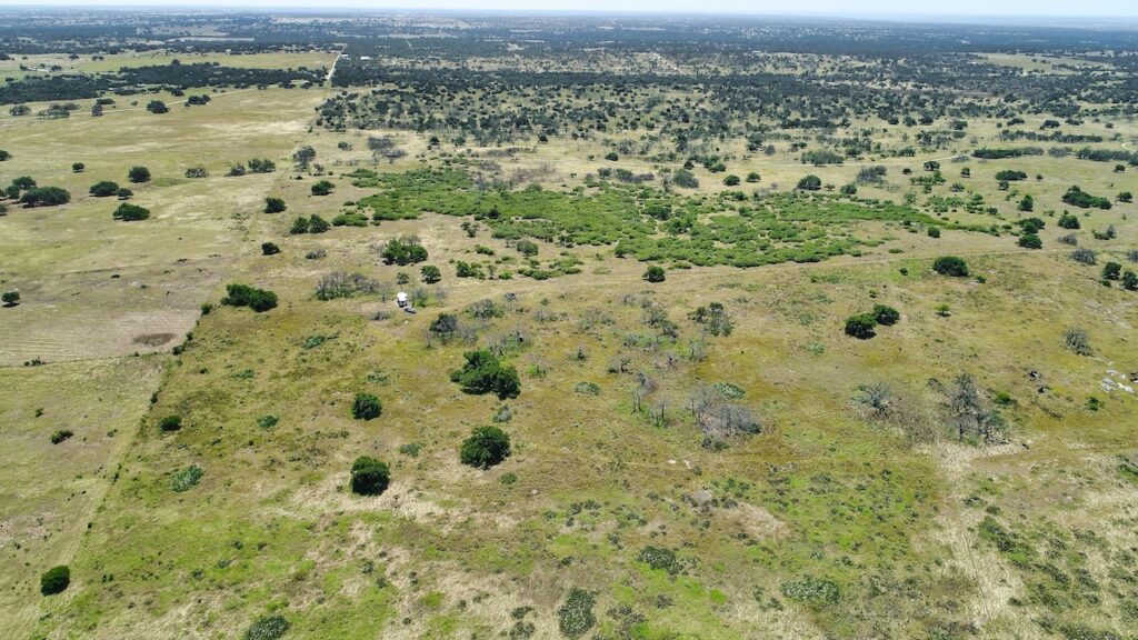 Aerial drone photo of the 12-acre property in Harper, TX