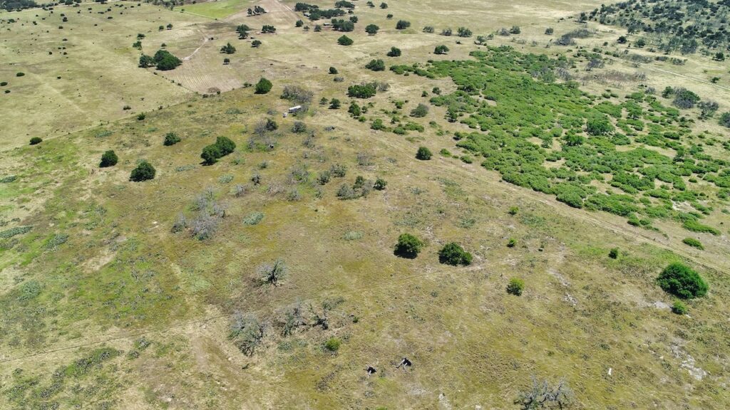 Aerial drone photo of the 12-acre property in Harper, TX