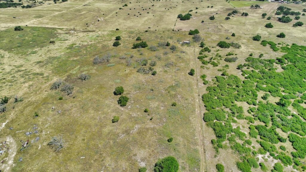 Aerial drone photo of the 12-acre property in Harper, TX