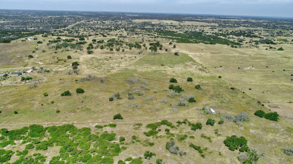 Aerial drone photo of the 12-acre property in Harper, TX