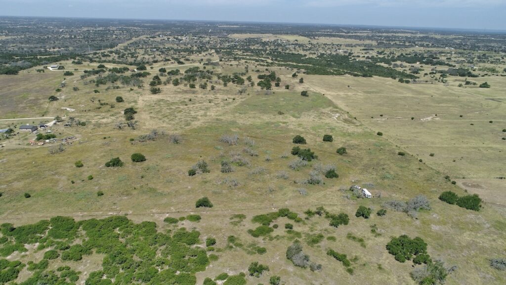 Aerial drone photo of the 12-acre property in Harper, TX