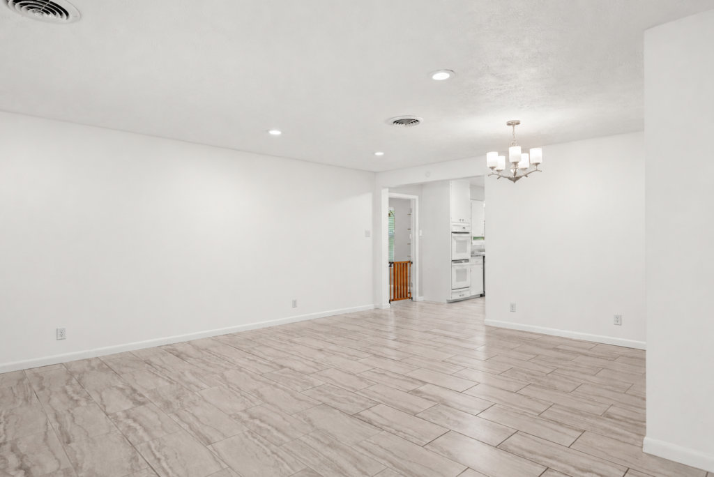 Freshly painted living area looking toward the kitchen at 705 Overhill Drive