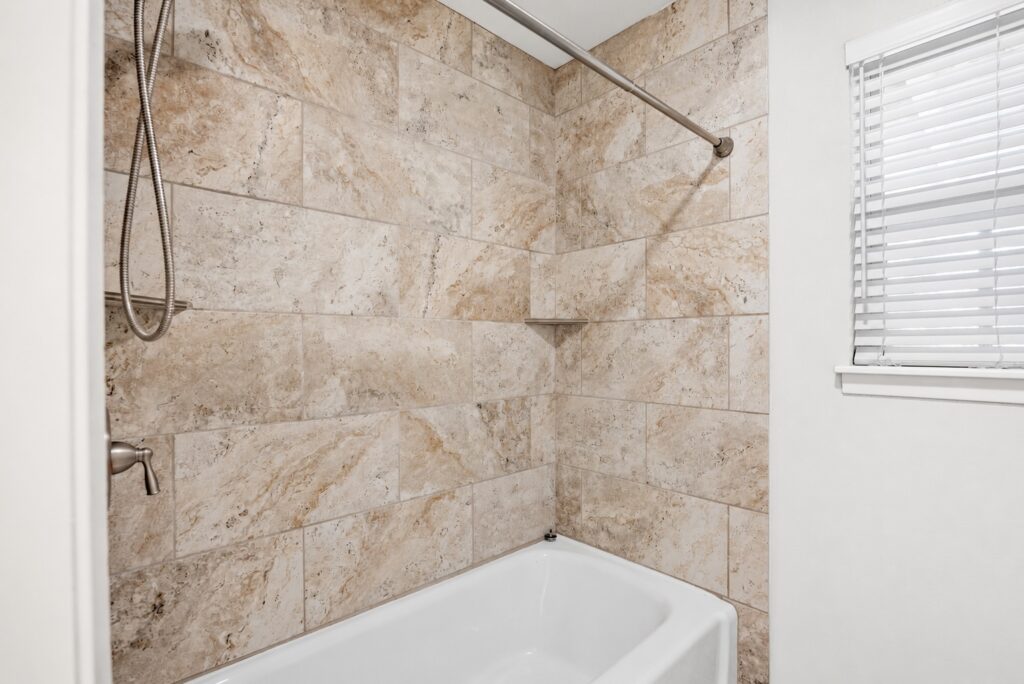 Second full bath with tub and shower at 705 Overhill Drive