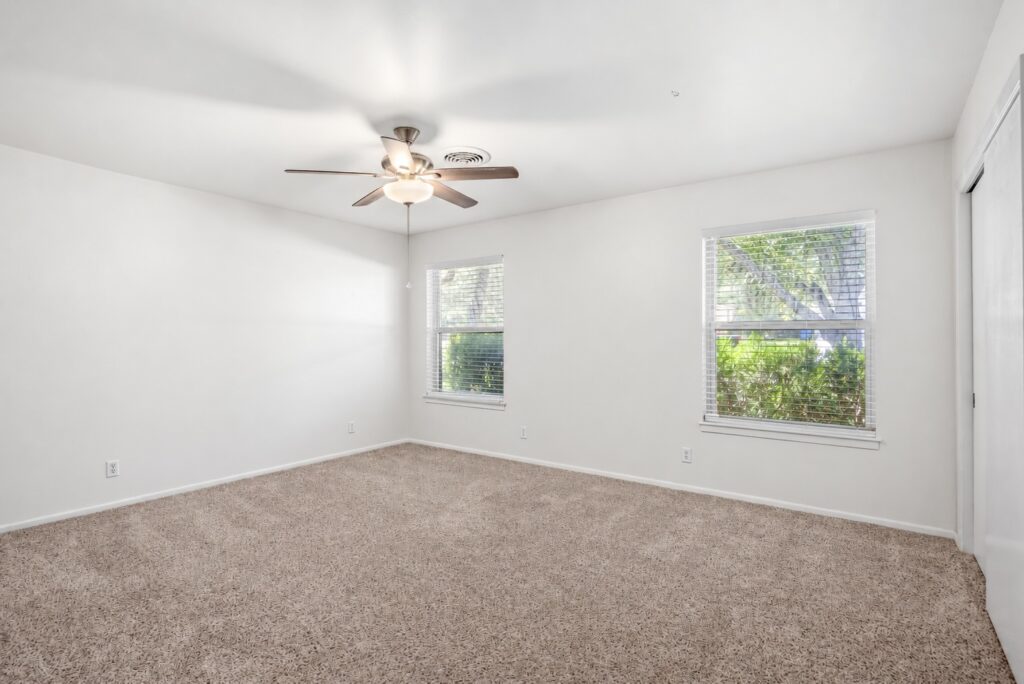 Third bedroom with fresh white walls